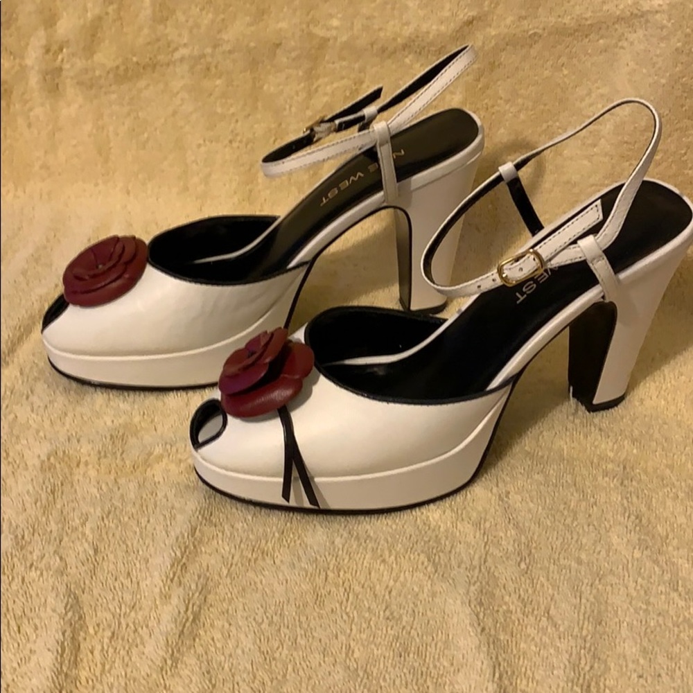 Kidskin, Sling back white heels with red flower